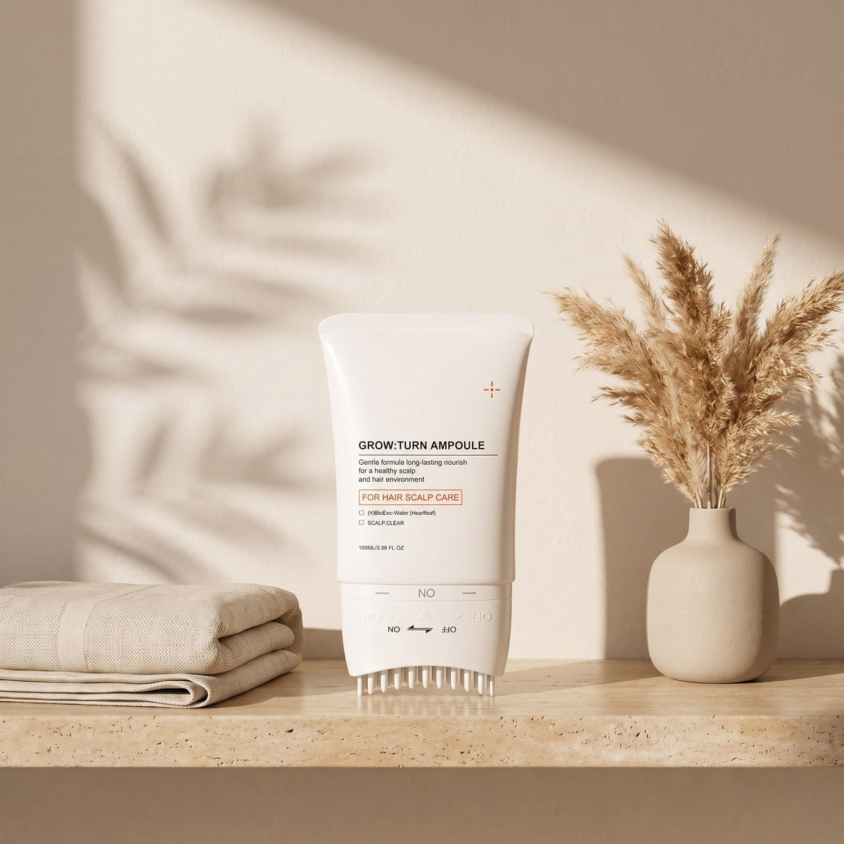 Hair Revive Brush Serum on a travertine bathroom shelf
